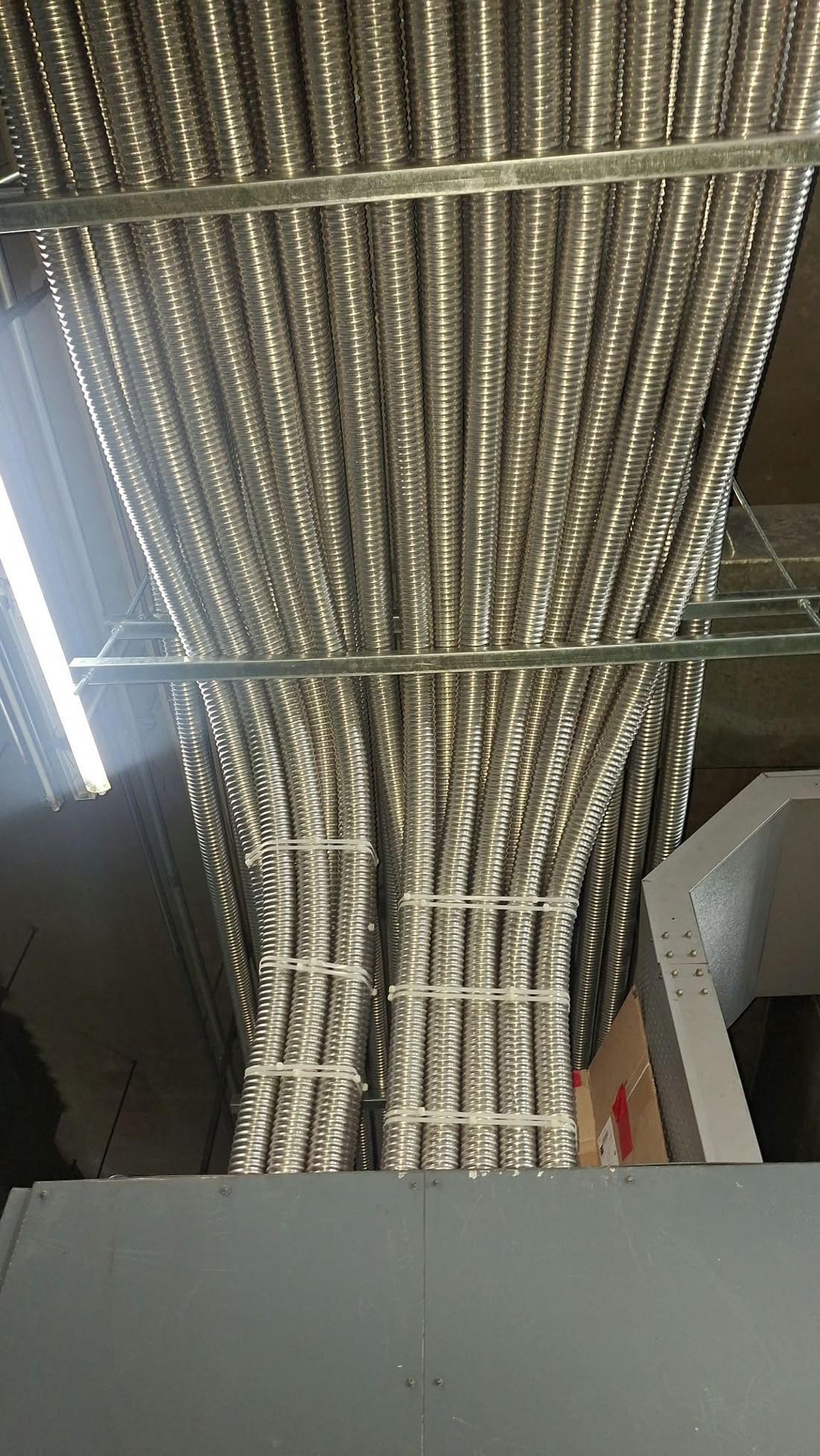 Flexible metal conduit riser bundle
