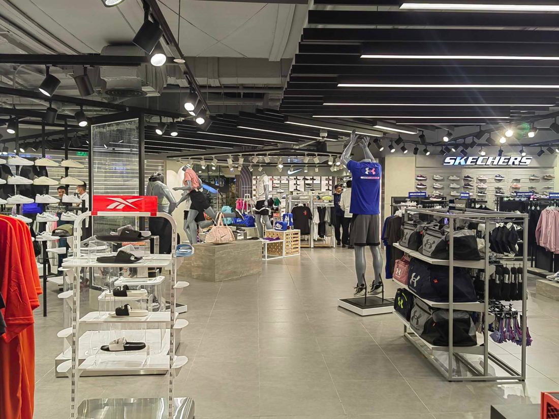 Sports Central interior with Skechers and Under Armour